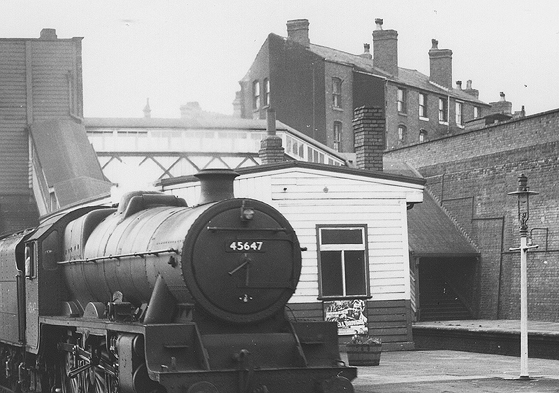 Close up showing the passenger waiting room erected in timber on Winson Green station's island platform