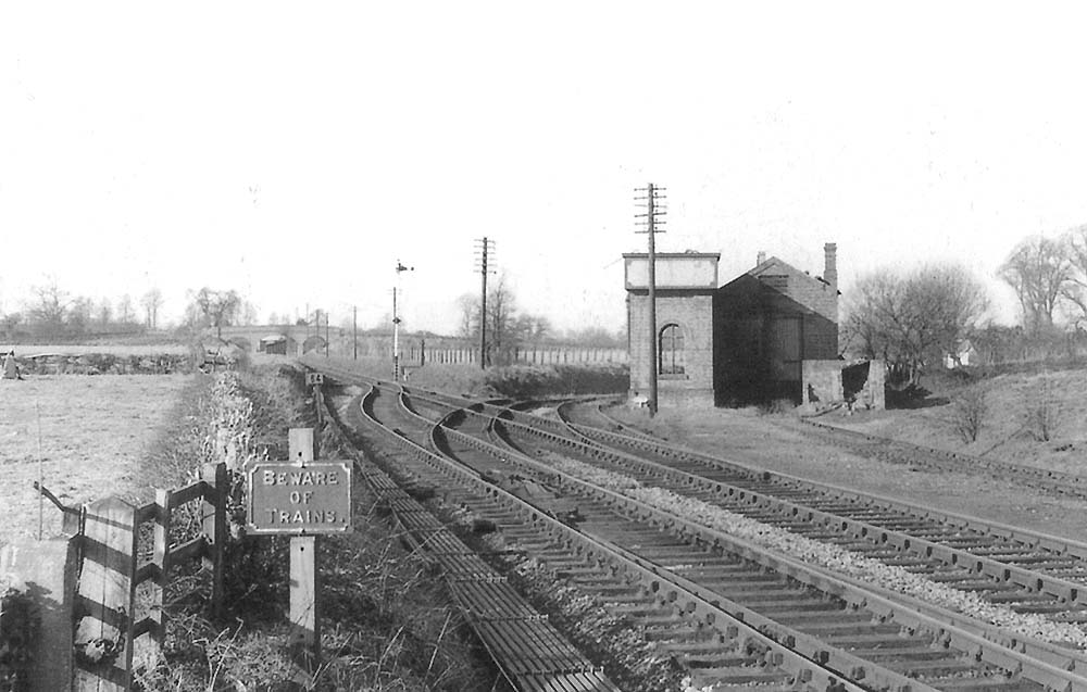 View of the junction with the Great Western Railway's branch line to Bearley with the GWR water tower and locomotive shed to its right