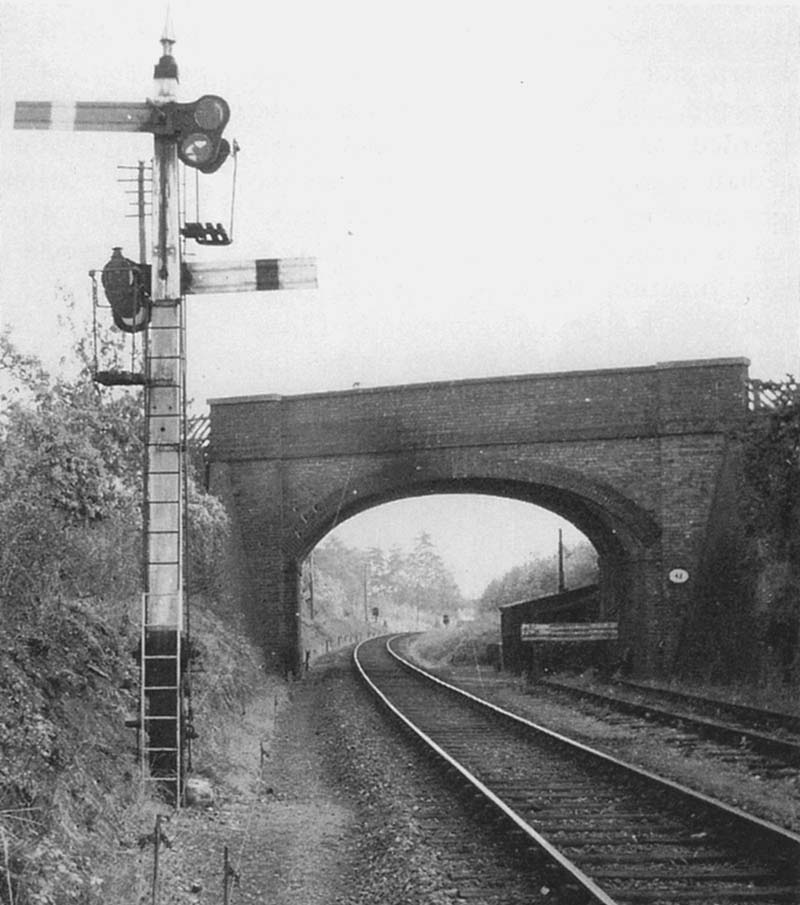 The dual operation Midland Railway signal post with the buffer stop to the twelve vehicle siding on the right