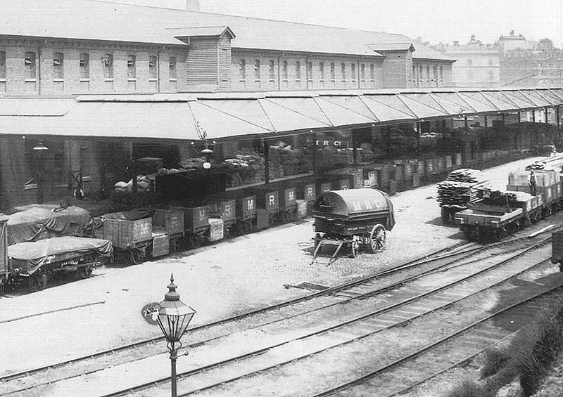 Close up showing the dray and lorry platform used for moving goods direct from the railway to the customer