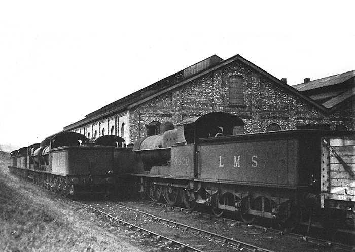 Ex-LNWR 4-6-0 goods locomotives Nos 8723, 8786, 8820, 8832, 8841, 8842 and 8869 stand on shed on Sunday 17th March 1935