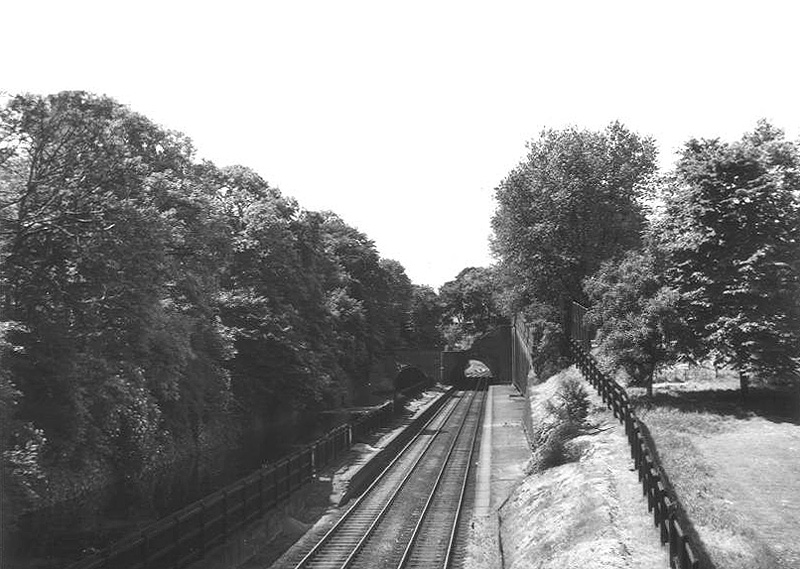 Elevated view looking in the direction of Kings Norton showing the now long abandoned station on 4th July 1954