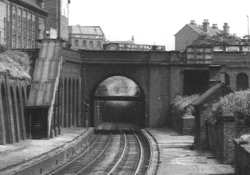 Close up of the Birmingham end of Five Ways station with Bath Row tunnel seen behind the road bridge