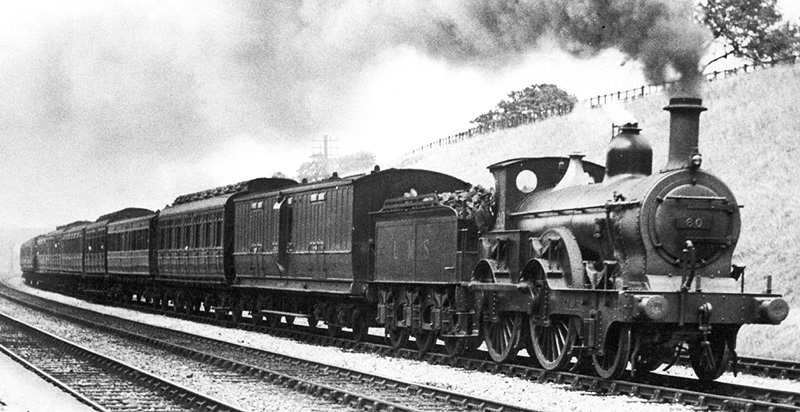 Ex-MR Kirtley double-framed 2-4-0 No 60 is seen at the head of a service travelling on the down fast line circa1931