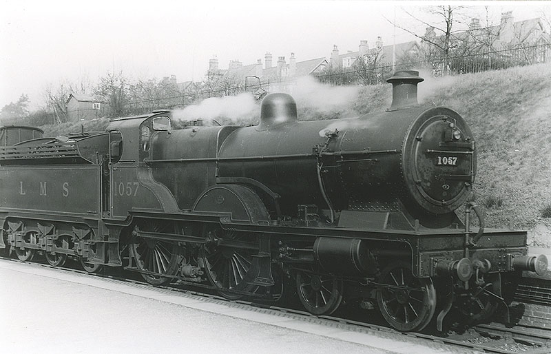 LMS 4-4-0 'Compound' 4P No 1057 pauses at the station prior to going forward to New Street station on 22nd April 1932