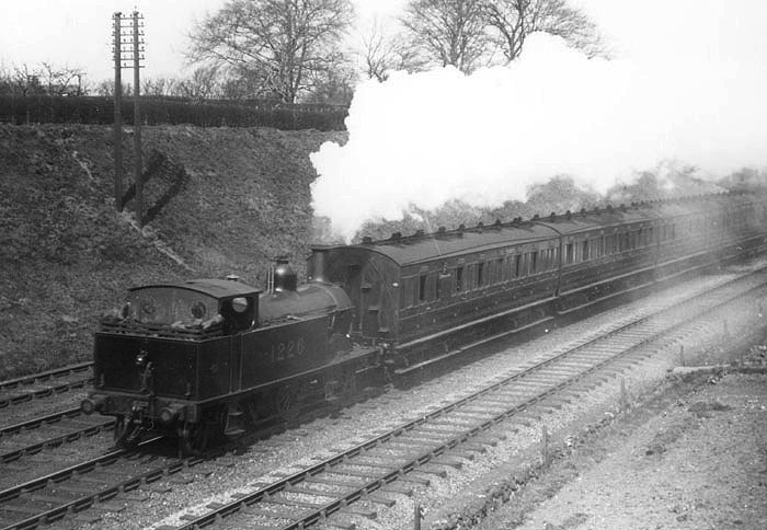MR 0-4-4T No 1226 running bunker first on a local passenger train