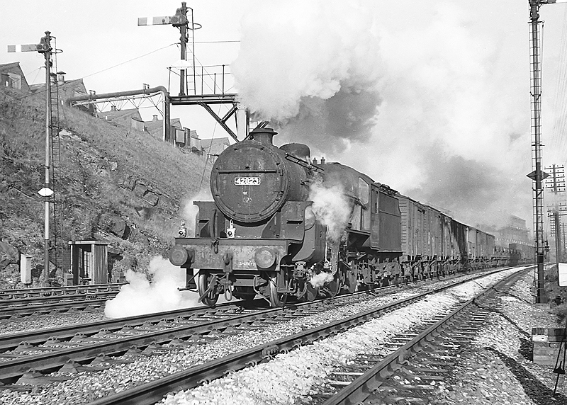 Ex-LMS 5MT 2-6-0 'Crab' No 42823 is seen on a passing express freight on 21st December 1963