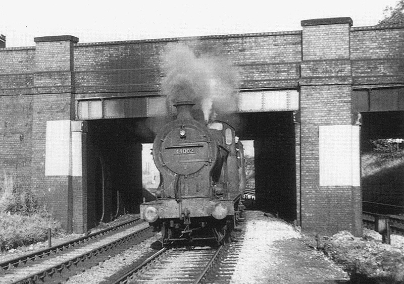Ex-LMS 0-6-0 4F No 44002, allocated to Canklow shed, is working a down ordinary passenger train on 19th September 1955