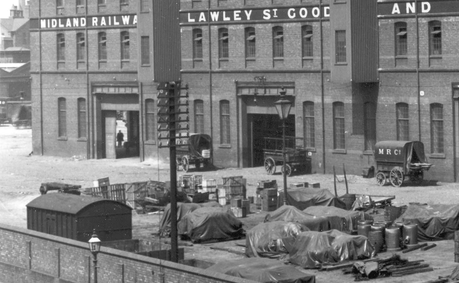 Close up showing Lawley Street Goods Shed's side entrances used by road transport and a variety of fragile goods and horse-drawn trailers