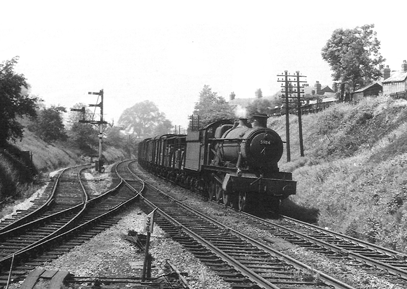 Ex-GWR 4-6-0 Hall class No 5984 'Linden Hall' is seen on a class D semi-fitted freight on 10th June 1963