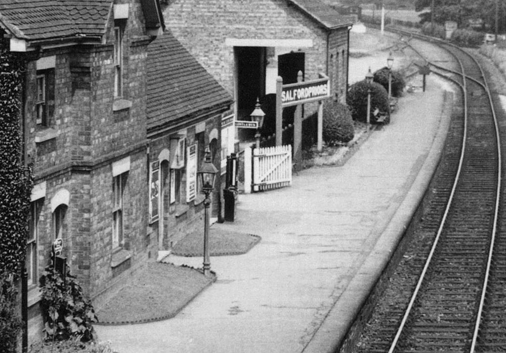 Close up showing the station's booking office and goods shed and yard in greater detail
