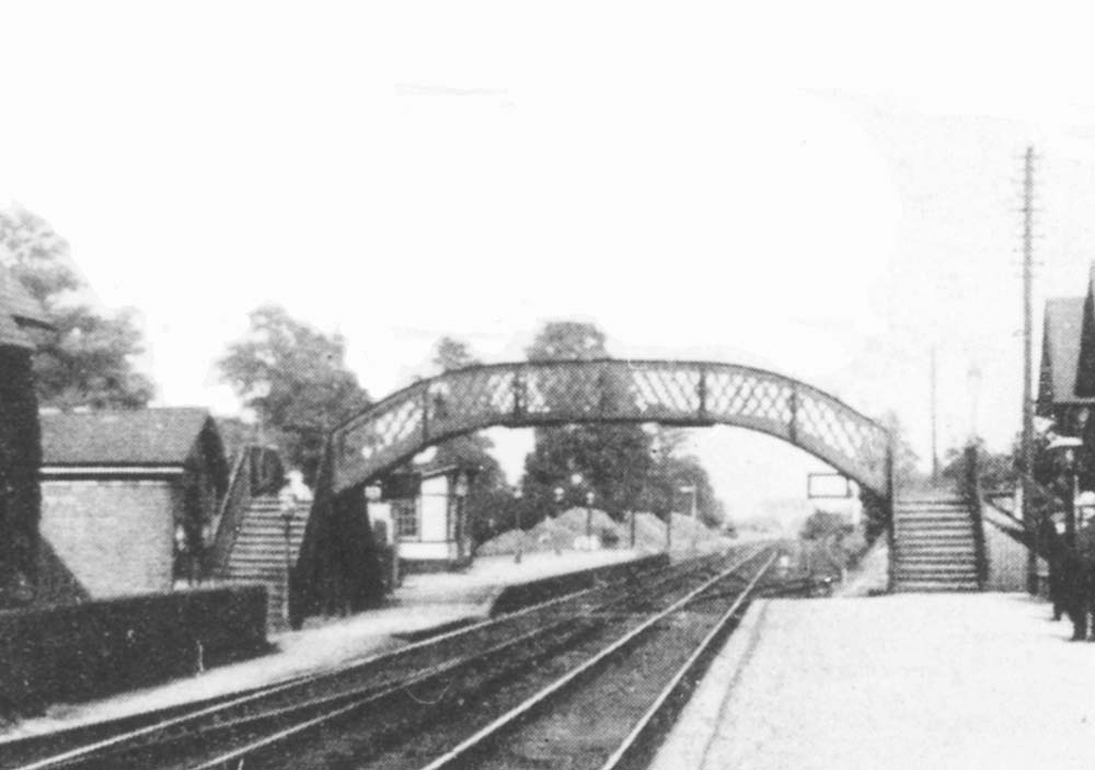 Close up showing the staggered platforms and on the left the up platform's small passenger waiting room