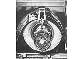 View of the Ro-Railer's later modified wheel lift system with the road wheel in the raised position