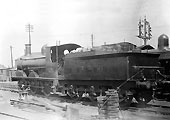 SMJ 0-6-0 No 7 complete with Beyer Peacock tender is seen stabled fully coaled and watered outside the shed