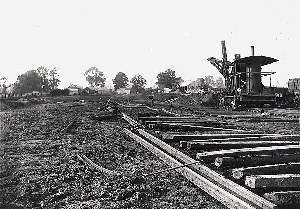 View of the steam navvy at work on a section of track south of Rugby