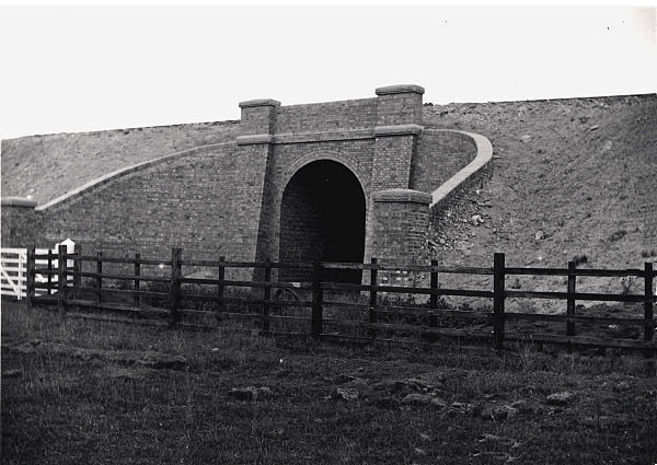 A completed brick arch occupation underbridge which carried the London Extension over a farm track just south of Wolfhampton around 1897