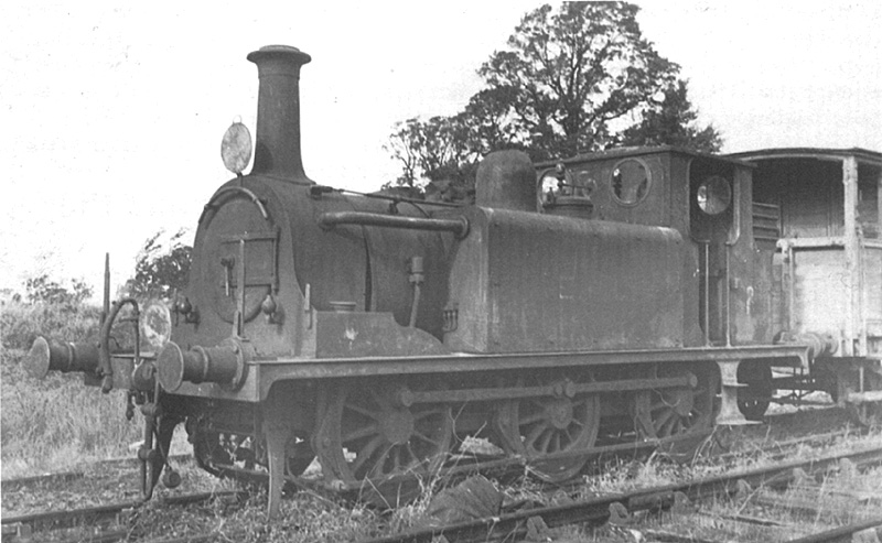 View of EHLR 0-6-0T No 2 ex-LBSCR No 674 'Shadwell' standing in front of the EHLR guards van circa 1930
