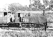 EHLR 0-6-0T No 2 is seen coupled to the brake van whilst being protected from the elements with a tarpaulin