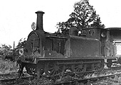 View of EHLR 0-6-0T No 2 ex-LBSCR No 674 'Shadwell' standing in front of the EHLR guards van circa 1930