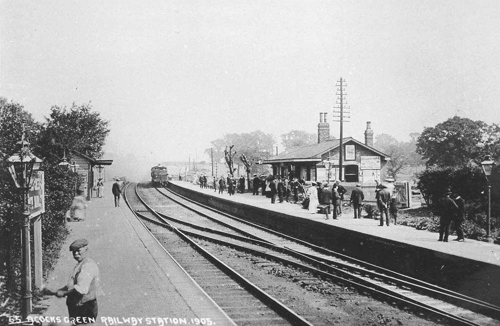 Looking towards Leamington from the Birmingham end of the up platform as a local passenger train for Snow Hill arrives at the down platform