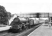 Ex-GWR 4-6-0 No 6011 'King James I' passes through the station with the 11:10am Paddington to Birkenhead service