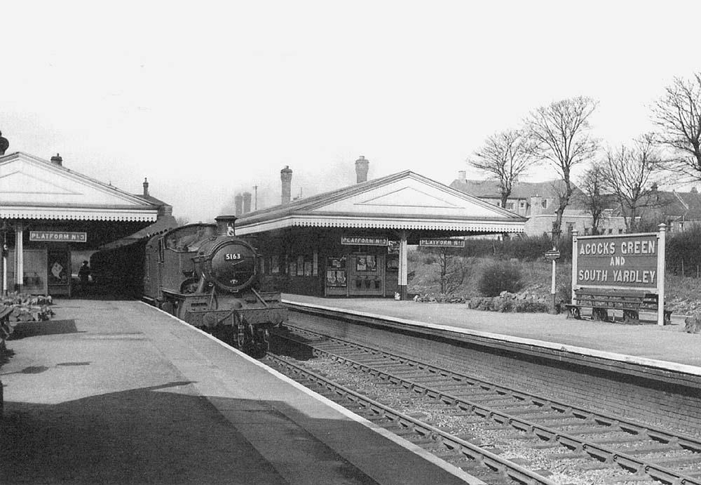 Ex-GWR 2-6-2T 5101 Class No 5163 stands on the up relief line platform with a Moor Street to Leamington service in 1957