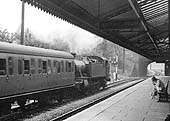 Ex-GWR 2-6-2T 5101 Class No 4114 restarts with an empty stock working from the station's goods loop on 22nd July 1959
