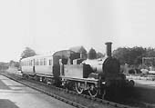 GWR �517� class 0-4-2T No.1157 with auto trailer No.76 waiting to depart from the platform at Alcester for Bearley