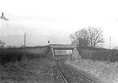 A ground level view looking towards Great Alne showing Aston Cantlow Halt's open framed timber construction