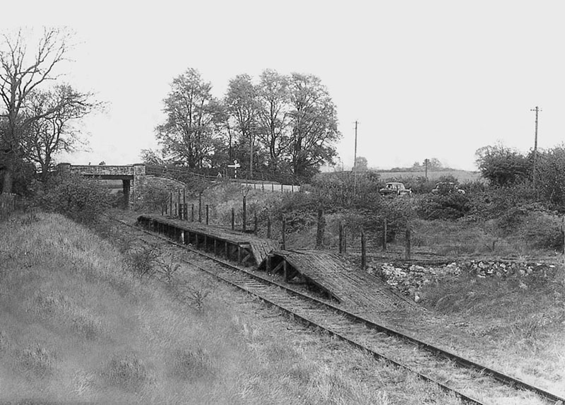View showing the platform collapsed following years of neglect with nature starting to reclaim the site