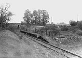 View showing the platform collapsed following years of neglect with nature starting to reclaim the site