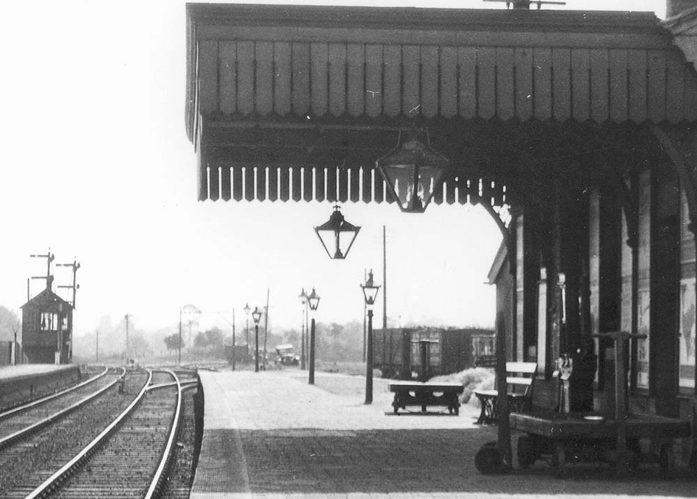 Close up showing the sidings in the distance and the mineral wagons adjacent to the goods shed