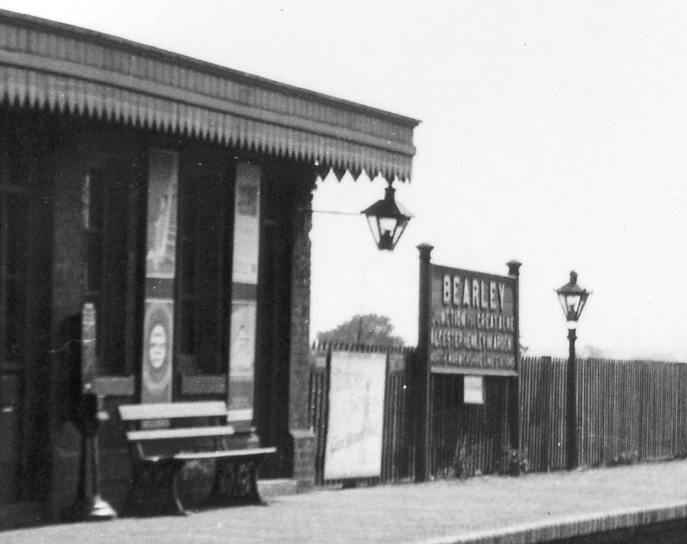 The platform to Stratford upon Avon with the station sign advising to change for Great Alne and Alcester