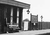 The platform to Stratford upon Avon with the station sign advising to change for Great Alne and Alcester
