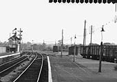 Close up showing Bearley East Junction Signal Box and the signal gantry controlling the line to Stratford on Avon and the north curve