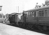 Close up showing the goods wagons being shunted forward into the goods yard by the 0-4-2T locomotive