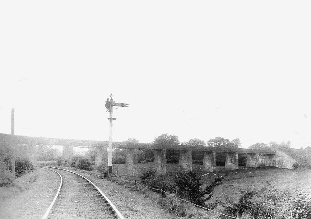 View of the branch line to Great Alne from Bearley as it approaches Edstone Aqueduct with the Bearley distant signal on the right