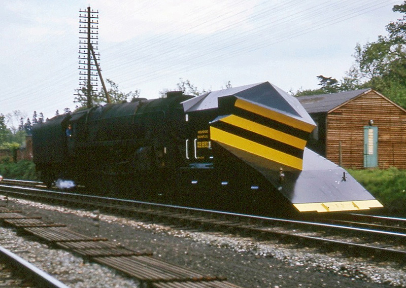 British Railways Standard class 9F 2-10-0 No 92197 is seen delivering a new snow plough to Newton Heath