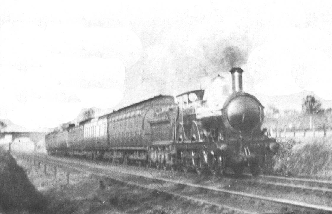 Great Western Railway 2-4-0 '3232' class No 3237 with an express headcode speeding past Bentley Heath