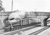 Ex-GWR 4-6-0 County Class No 1008 'County of Cardigan' is seen on a down Bournemouth service on one Saturday in August 1957