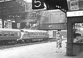 British Railways Type 4 Warship class D827 'Kelly' waits at Platform 7 with the 7 30am Shrewsbury to Paddington service due to arrive at 11 am in London