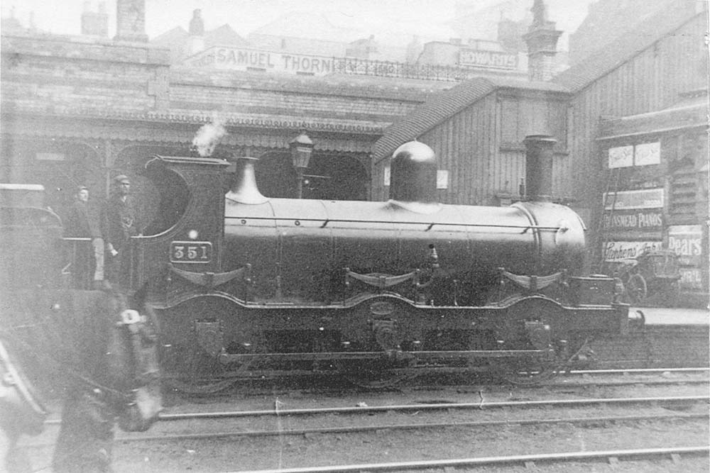 GWR 0-6-0 No 351, a class 322 design, is seen standing at the up platform at the South end of Snow Hill station with the steps to the hotel in the background