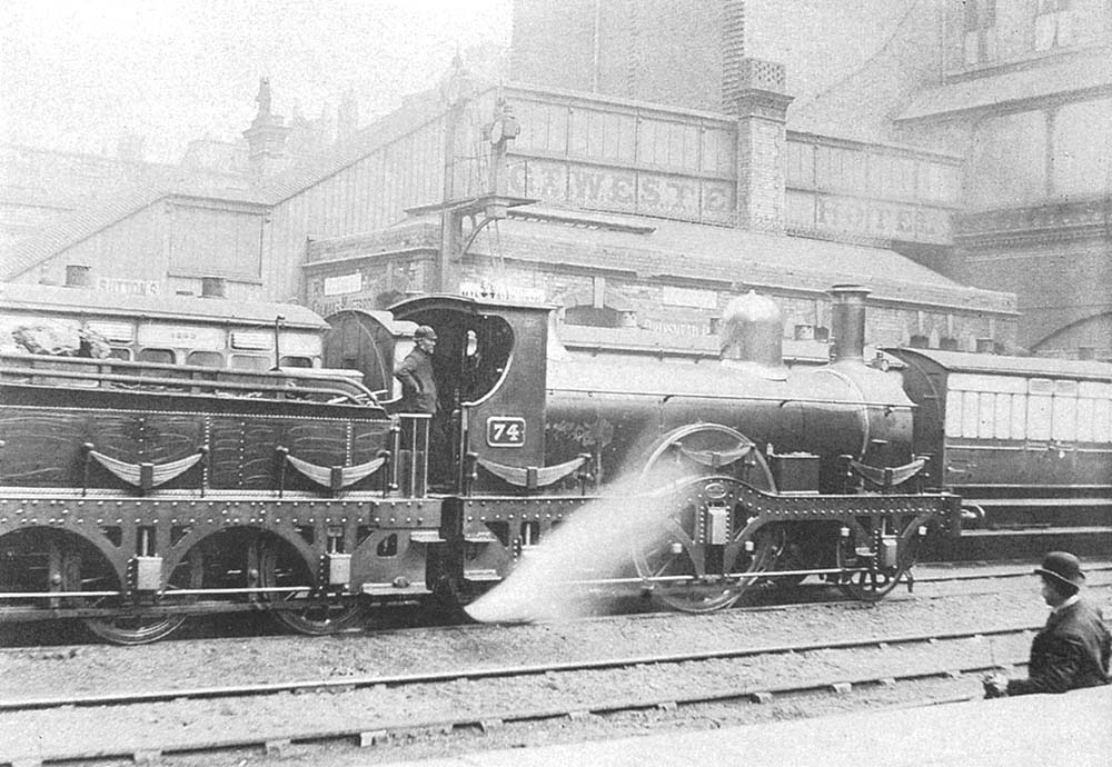 GWR 2-2-2 'Gooch Single' No 74 is seen standing on the up middle through road at the South end of Snow Hill station on 5th May 1894