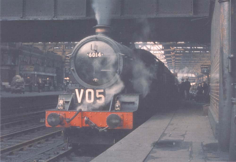 Ex-GWR 4-6-0 King class No 6014 'King Henry VII' is seen standing at the end of Platform 7 whilst at the head of the 8 55am Birkenhead to Paddington express service