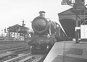 GWR 4-6-0 Hall class No 5914 'Ripon Hall' is seen standing at the head of a down express service to Wolverhampton on 5th June 1937