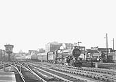Ex-GWR 4-6-0 King class No 6000 'King George V, the first in a class of 30 locomotives, is seen approaching Snow Hill on an up Class A express passenger service