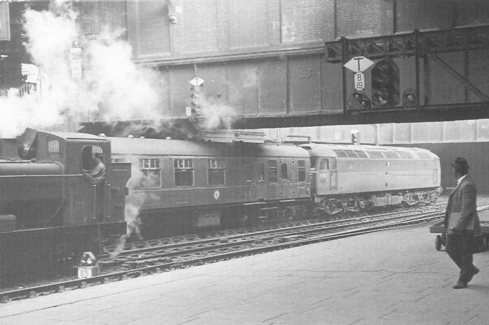 British Railways 'Brush Type 4' D1595, later Class 47 No 47469, is seen standing at Platform 7 at the head of an up express service to Paddington on 5th May 1966