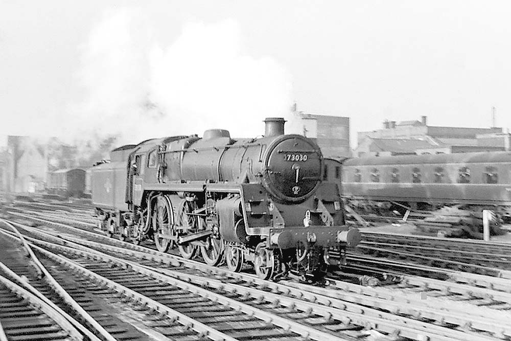 British Railways 4-6-0 Standard Class 5MT No 73030 is seen running light engine on Snow Hill's up through road on its way to Tyseley shed