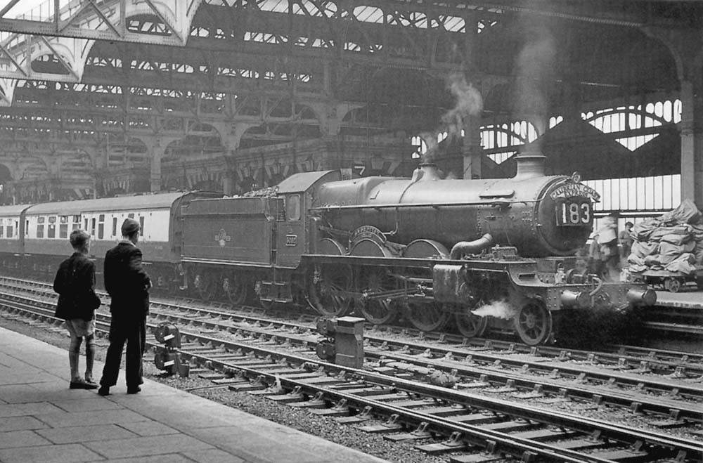 Ex-GWR 4-6-0 Castle class No 5082 'Swordfish' is seen standing at Platform 7 whilst at the head of the up 'Cambrian Coast Express on 31st August 1957