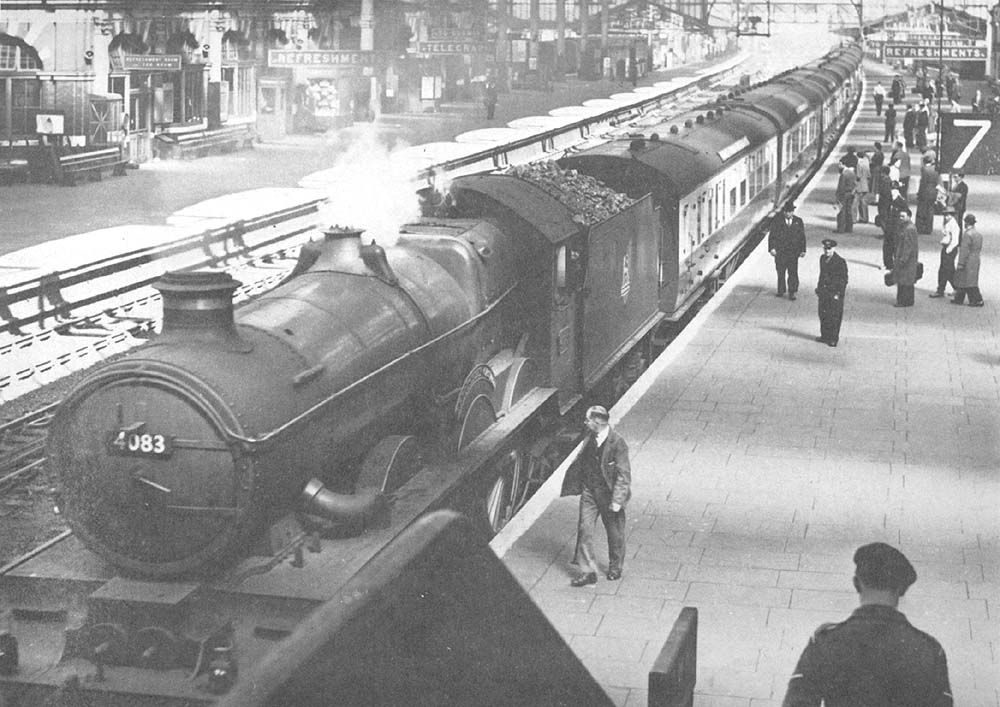 Ex-GWR 4-6-0 Castle class No 4083 'Abbotsbury Castle' is seen blowing off steam whilst standing at Platform 7 at the head of an up express service to Paddington